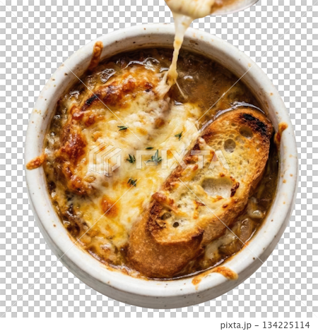 Comforting bowl of French onion soup, warm gratinee food with delicious golden melted cheese crust on top 134225114