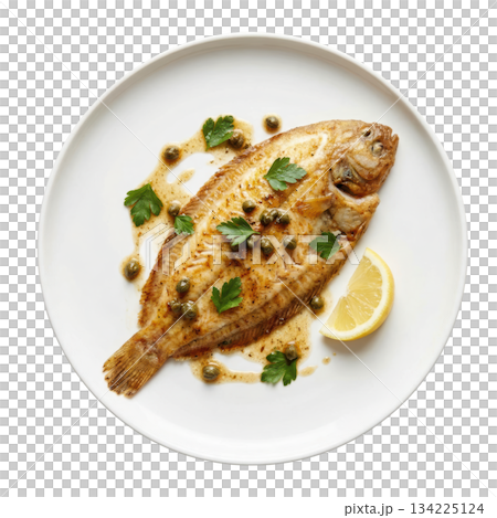 Delicious sole meuniere, gourmet dover sole fish pan fried in brown butter sauce with lemon and parsley on plate 134225124