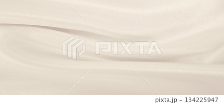 Smooth elegant golden silk or satin luxury cloth texture as wedding background. Luxurious background design. In Sepia toned. Retro style Smooth elegant golden silk or satin luxury cloth texture as wedding background. Luxurious background design. In Sepia toned. Retro style 134225947