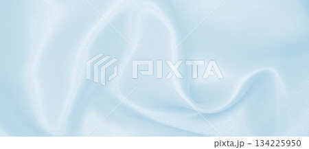 Smooth elegant blue silk or satin luxury cloth texture as abstract background. Luxurious background design Smooth elegant blue silk or satin luxury cloth texture as abstract background. Luxurious background design 134225950