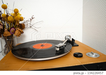 Vinyl disk on player in playing position 134226457