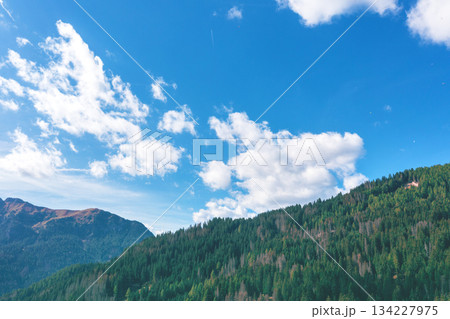 Mountain ridge with blue sky. Mountain landscape at daylight. Grossglockner High Alpine Road. Austria, Europe 134227975