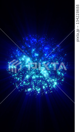 Bright cluster of shimmering blue particles forming a glowing energy burst against a deep dark background Bright cluster of shimmering blue particles forming a glowing energy burst against a deep dark background 134228688