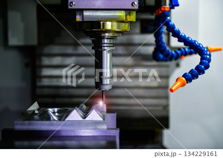 Spindle cutting tool Rotary 5-axis CNC milling machine during deburring of engine parts, heavy industry plan 134229161