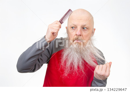 Bald elderly man with a long gray beard  134229647