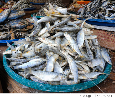 A large pile of fresh salted fish on display at a traditional market 134229784