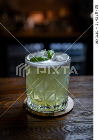 Refreshing green basil cocktail Refreshing green basil cocktail 134229788