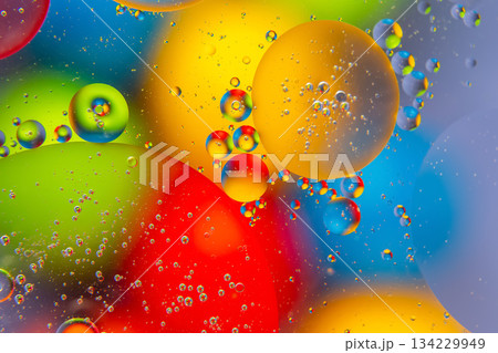 Colorful water droplets in red, yellow, blue, and green Colorful water droplets in red, yellow, blue, and green 134229949