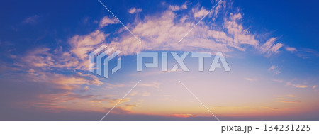 Colorful cloudy sky at sunset. Gradient color. Sky texture. Abstract nature background. Horizontal banner 134231225