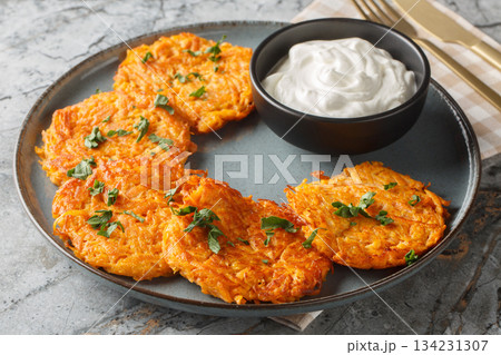 Fried sweet potato Hashbrown Patty closeup on the plate. Horizontal 134231307