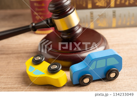 Car accident lawsuit and insurance, Judge hammer with car model. 134233049