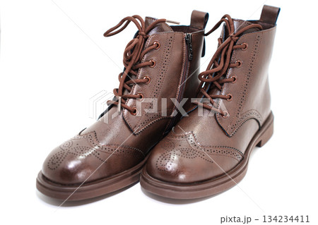 Stylish brown boots with unique design and laces 134234411