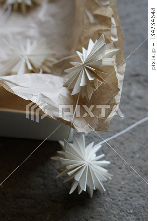 beautiful handmade paper decoration snowflake shape garland vertical photo 134234648