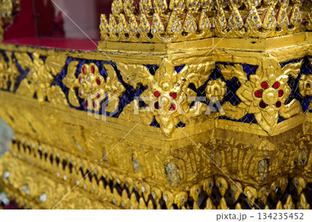 The gold and blue design on the table is ornate and intricate The gold and blue design on the table is ornate and intricate 134235452
