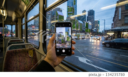 Passenger View of Green Futuristic Cityscape from Electric Transport Passenger View of Green Futuristic Cityscape from Electric Transport 134235780