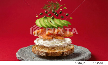 Deconstructed Salmon And Avocado Toast Ingredients red background 134235819