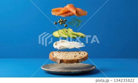 Deconstructed Salmon And Avocado Toast Ingredients blue background 134235822