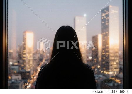 Silhouette Contemplating Passive Income Cityscape Through Window Silhouette Contemplating Passive Income Cityscape Through Window 134236008