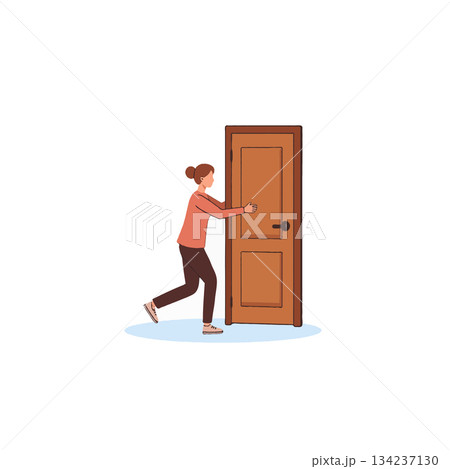 Young woman approaching a sturdy wooden door expressing curiosity in an open space minimalist Young woman approaching a sturdy wooden door expressing curiosity in an open space minimalist 134237130