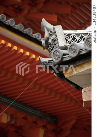 The Onigawara tile blends artistic elegance with spiritual symbolism on the Japanese traditional temple roof. 134239407