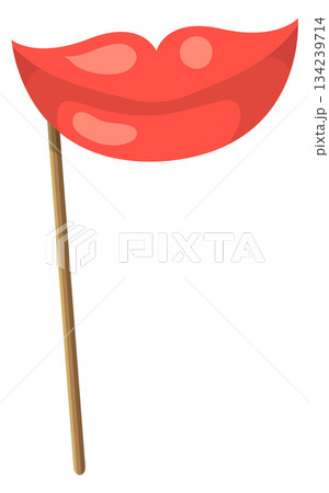 A red fake lip with a wooden stick 134239714