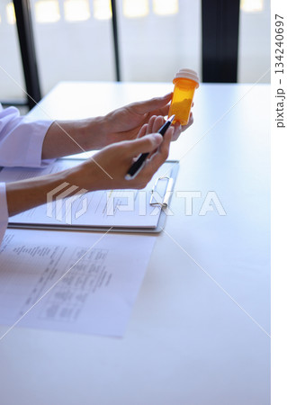 Doctor or General practitioner explain to patient how to use prescribed medicine correctly by explain dosage, frequency, and timing. 134240697