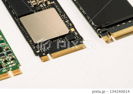 Close up of M.2 SSD connectors and chips on white background Close up of M.2 SSD connectors and chips on white background 134240814
