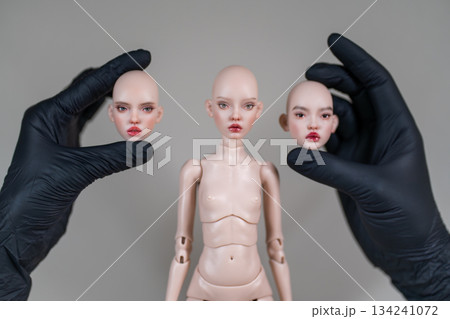 Ball jointed doll and interchangeable heads held 134241072