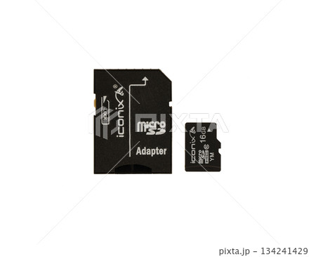 A black micro SD card with a white label that says "Iconix" on it 134241429