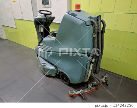 Self-propelled floor scrubber with operator seat. Ride-on floor scrubber machine Self-propelled floor scrubber with operator seat. Ride-on floor scrubber machine 134242250