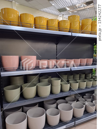 Ceramic products in flower shop 134242277