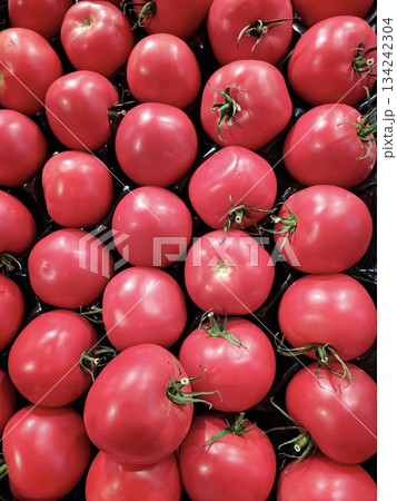 Red tomatoes. Vegetables at grocery store 134242304