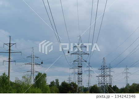 Power transmission towers and storm clouds 134242346