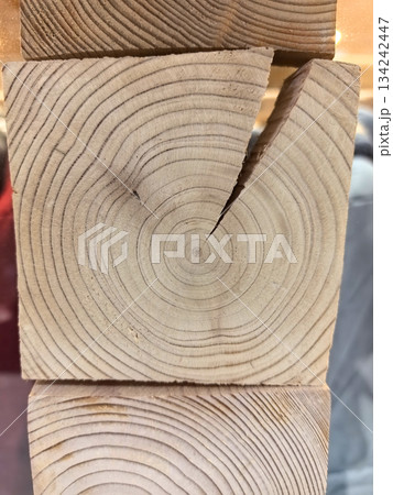 Unique wood texture with circular patterns and significant split detail 134242447
