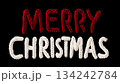 Bright greeting card with red and white knitted 'Merry Christmas' text on black background 134242784