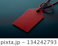 Red tag on dark background for branding, price labels and holiday offers 134242793