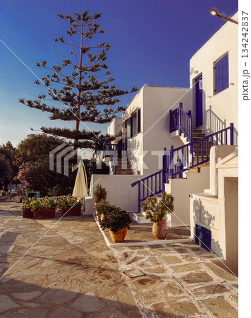 Mykonos island with traditional whitewashed homes, cycladic architecture,capturing travel, tourism, and mediterranean lifestyle Mykonos island with traditional whitewashed homes, cycladic architecture,capturing travel, tourism, and mediterranean lifestyle 134242837
