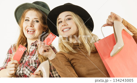 Two woman after sale shopping Two woman after sale shopping 134243005