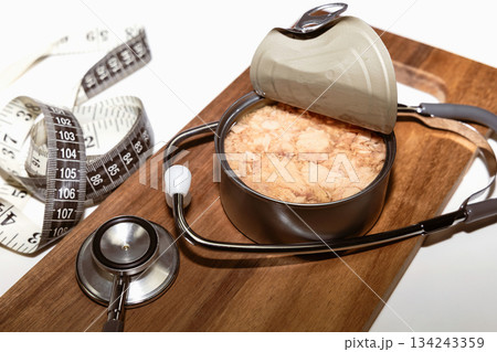 Fresh tuna in open can for healthy diet concept. Fresh tuna in open can for healthy diet concept. 134243359