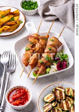 Chicken skewers kebab with vegetables 134243510