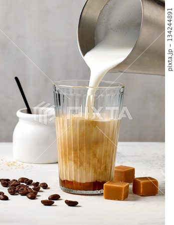 process of making caramel latte process of making caramel latte 134244891