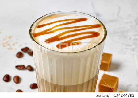 closeup of caramel latte coffee glass 134244892