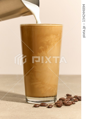 process of making caramel latte 134244894