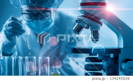 最先端の研究所で実験を行う白衣の研究者と顕微鏡のクローズアップ 134245026