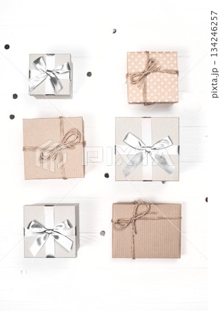 Gifts and presents for celebration with confetti. Color of 2026 year dancer in the white cloud 134246257