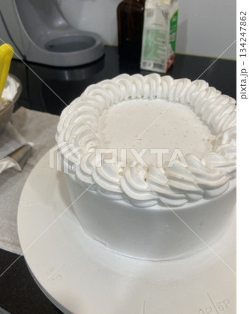 A delicious, fluffy cake with layers of rich flavor, perfect for any occasion. Often topped with frosting or fresh fruits, it's a sweet treat that brings joy to every bite. 134247862