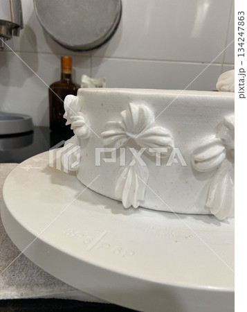 A delicious, fluffy cake with layers of rich flavor, perfect for any occasion. Often topped with frosting or fresh fruits, it's a sweet treat that brings joy to every bite. 134247863