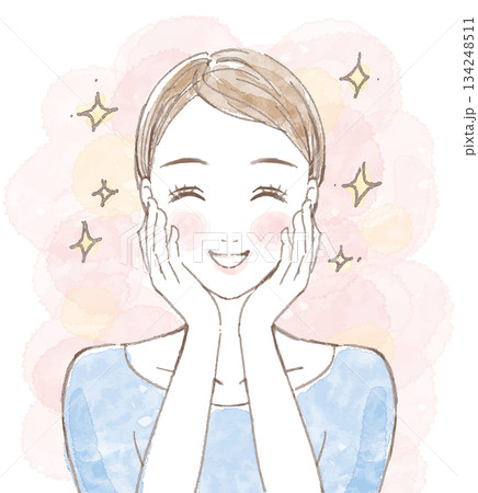 前髪をまとめて頬に手をあてた笑顔の女性 前髪をまとめて頬に手をあてた笑顔の女性 134248511