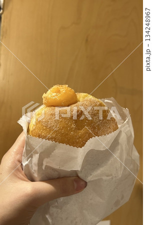 Bomboloni, soft Italian doughnuts filled with creamy custard or jam, dusted with powdered sugar. Fluffy and indulgent, they’re a perfect sweet treat, enjoyed fresh and warm with every bite. 134248967