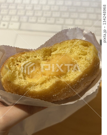 Bomboloni, soft Italian doughnuts filled with creamy custard or jam, dusted with powdered sugar. Fluffy and indulgent, they’re a perfect sweet treat, enjoyed fresh and warm with every bite. 134248968